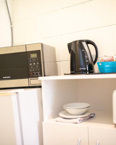 Home appliances in the Queen Single Room at Mundubbera Motel