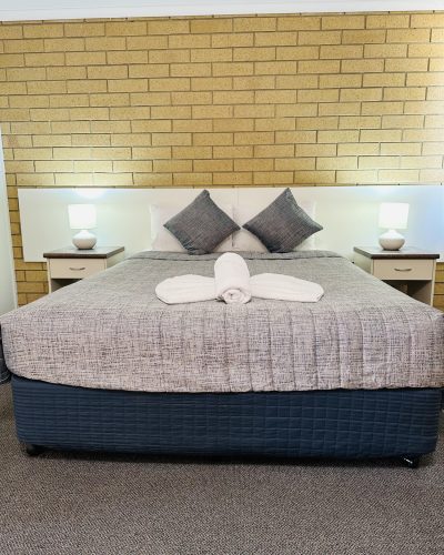 Cosy deluxe queen room with a premium king bed in Deluxe Queen Disabled Access Room