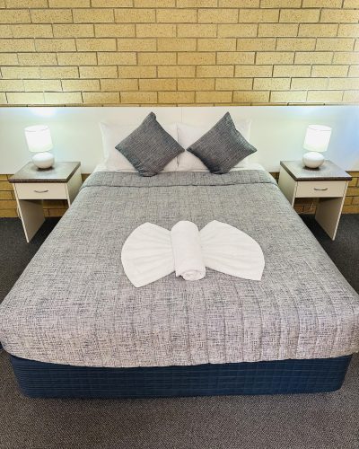 Cosy deluxe queen room with a premium king bed in Deluxe Queen Disabled Access Room